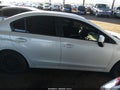 2014 Subaru Impreza — photo 13 of 16 | VIN JF1GJAC69EH019940
