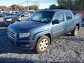 2010 Honda Ridgeline — photo 2 of 17 | VIN 5FPYK1F42AB010942