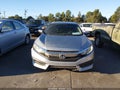 2018 Honda Civic — photo 12 of 16 | VIN 19XFC2E53JE025355
