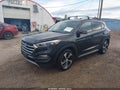 2017 Hyundai Tucson — photo 2 of 11 | VIN KM8J3CA26HU571960