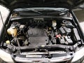 2008 Mazda Tribute — photo 10 of 18 | VIN 4F2CZ96138KM28779