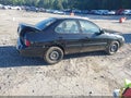 2003 Nissan Sentra — photo 4 of 18 | VIN 3N1CB51D53L703027