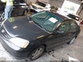2001 Honda Civic — photo 12 of 15 | VIN 1HGES15531L034817