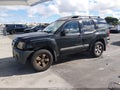 2013 Nissan Xterra — photo 2 of 16 | VIN 5N1AN0NW6DN811521