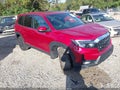 2023 Honda Passport — photo 1 of 15 | VIN 5FNYF8H53PB008640