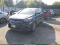 2017 Hyundai Santa Fe — photo 2 of 16 | VIN 5XYZTDLB6HG438000