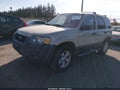 2005 Ford Escape — photo 2 of 12 | VIN 1FMYU93135KD73671