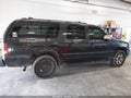 2003 GMC Yukon XL — photo 13 of 16 | VIN 3GKFK16TX3G225896