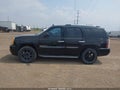 2007 GMC Yukon — photo 14 of 16 | VIN 1GKFK63817J164343