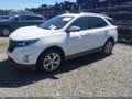 2018 Chevrolet Equinox — photo 2 of 16 | VIN 2GNAXKEX5J6268818