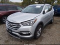 2018 Hyundai Santa Fe — photo 2 of 17 | VIN 5XYZU3LB2JG555490