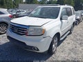 2015 Honda Pilot — photo 2 of 16 | VIN 5FNYF3H64FB006731