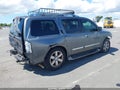 2014 Nissan Armada — photo 4 of 17 | VIN 5N1BA0NF7EN603536