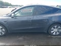 2023 Tesla Model Y — photo 13 of 18 | VIN 7SAYGAEEXPF913727