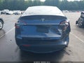 2023 Tesla Model Y — photo 15 of 18 | VIN 7SAYGAEEXPF913727