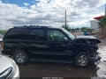 2001 Chevrolet Tahoe — photo 13 of 16 | VIN 1GNEC13T91R159208