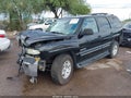 2001 Chevrolet Tahoe — photo 2 of 16 | VIN 1GNEC13T91R159208