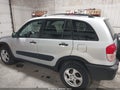 2001 Toyota RAV4 — photo 14 of 16 | VIN JTEGH20V610012939