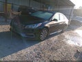 2015 Hyundai Sonata — photo 2 of 11 | VIN 5NPE34AF7FH072168