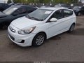 2014 Hyundai Accent — photo 2 of 11 | VIN KMHCT5AE0EU149614