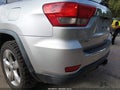 2011 Jeep Grand Cherokee — photo 13 of 14 | VIN 1J4RR5GTXBC581724