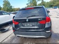 2014 BMW X1 — photo 16 of 17 | VIN WBAVL1C55EVY20933