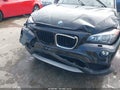 2014 BMW X1 — photo 6 of 17 | VIN WBAVL1C55EVY20933