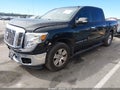 2018 Nissan Titan — photo 2 of 16 | VIN 1N6AA1EK6JN528855