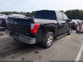 2018 Nissan Titan — photo 4 of 16 | VIN 1N6AA1EK6JN528855