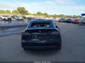 2021 Tesla Model Y — photo 16 of 22 | VIN 5YJYGDEE8MF244691