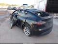 2021 Tesla Model Y — photo 3 of 22 | VIN 5YJYGDEE8MF244691