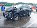 2016 Hyundai Santa Fe — photo 2 of 17 | VIN 5XYZU3LB1GG330549