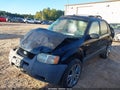 2001 Ford Escape — photo 2 of 16 | VIN 1FMYU02151KE82673