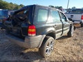 2001 Ford Escape — photo 4 of 16 | VIN 1FMYU02151KE82673