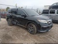 2021 Honda Piloto — photo 1 of 16 | VIN 5FNYF6H60MB039787