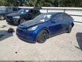 2021 Tesla Model Y — photo 2 of 19 | VIN 5YJYGDEE0MF089571