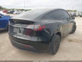 2024 Tesla Model Y — photo 4 of 18 | VIN 7SAYGDEE7RA247573