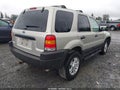 2003 Ford Escape — photo 4 of 18 | VIN 1FMCU93183KA90612