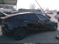2022 Tesla Model Y — photo 13 of 18 | VIN 7SAYGDEF7NF351311