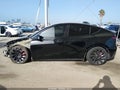 2022 Tesla Model Y — photo 14 of 18 | VIN 7SAYGDEF7NF351311