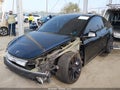 2022 Tesla Model Y — photo 2 of 18 | VIN 7SAYGDEF7NF351311