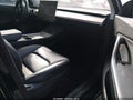 2022 Tesla Model Y — photo 5 of 18 | VIN 7SAYGDEF7NF351311