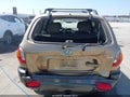 2003 Hyundai Santa Fe — photo 6 of 11 | VIN KM8SC73E53U462787
