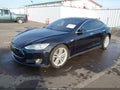 2015 Tesla Model S — photo 2 of 18 | VIN 5YJSA4H40FF088384