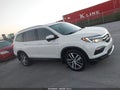 2018 Honda Pilot — photo 13 of 16 | VIN 5FNYF5H98JB008769