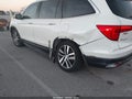 2018 Honda Pilot — photo 6 of 16 | VIN 5FNYF5H98JB008769
