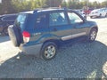 2003 Toyota RAV4 — photo 4 of 11 | VIN JTEHH20V730245221