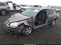 2009 Volkswagen Rabbit — photo 2 of 16 | VIN WVWBB71K99W039952
