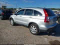 2009 Honda CR-V — photo 3 of 11 | VIN 5J6RE38769L001204