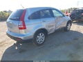 2009 Honda CR-V — photo 4 of 11 | VIN 5J6RE38769L001204